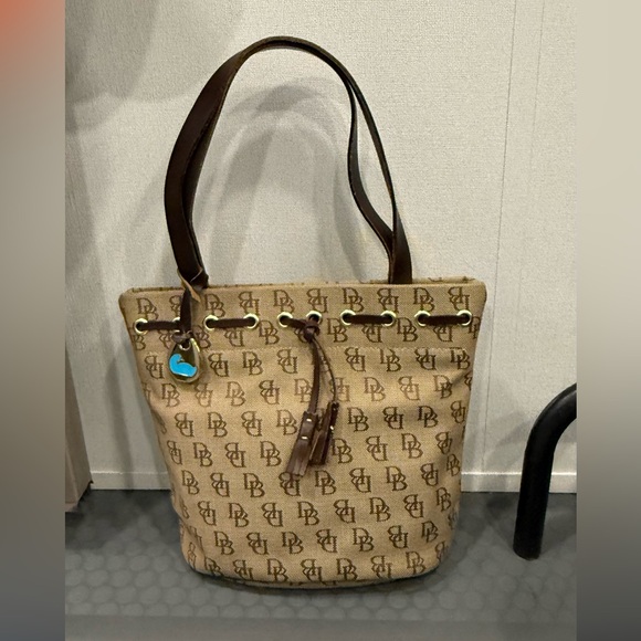 Dooney & Bourke Canvas Leather Monogram Medium Tassel Bucket Shoulder Bag - Picture 1 of 12